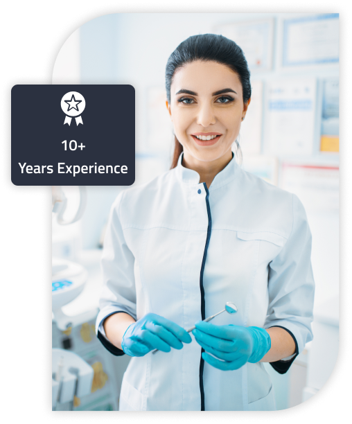 A dentist holding a teeth cleaning tool.
